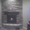 Fireplace installation - turn key fireplace tear-out and replacement project that included mantle and veneer stack stone installation - completed.  This job took two men 3.5 days to complete.