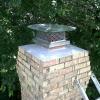 mortar crown repair and stainless steel chimney cap installed on a masonry chimney, this puppy will look the same in 20 years.